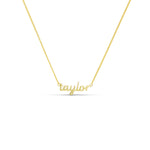 Baby Script Nameplate necklace in gold with the name taylor