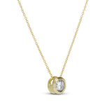 Side view of the gold CZ Bezel Necklace pendant