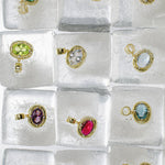 Birthstone Necklace pendants in purple, pink, green, clear and blue set on ice cubes