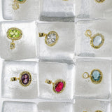 Birthstone Necklace pendants in purple, pink, green, clear and blue set on ice cubes