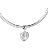 Birthstone Necklace in silver with a clear pendant on a silver cuff necklace