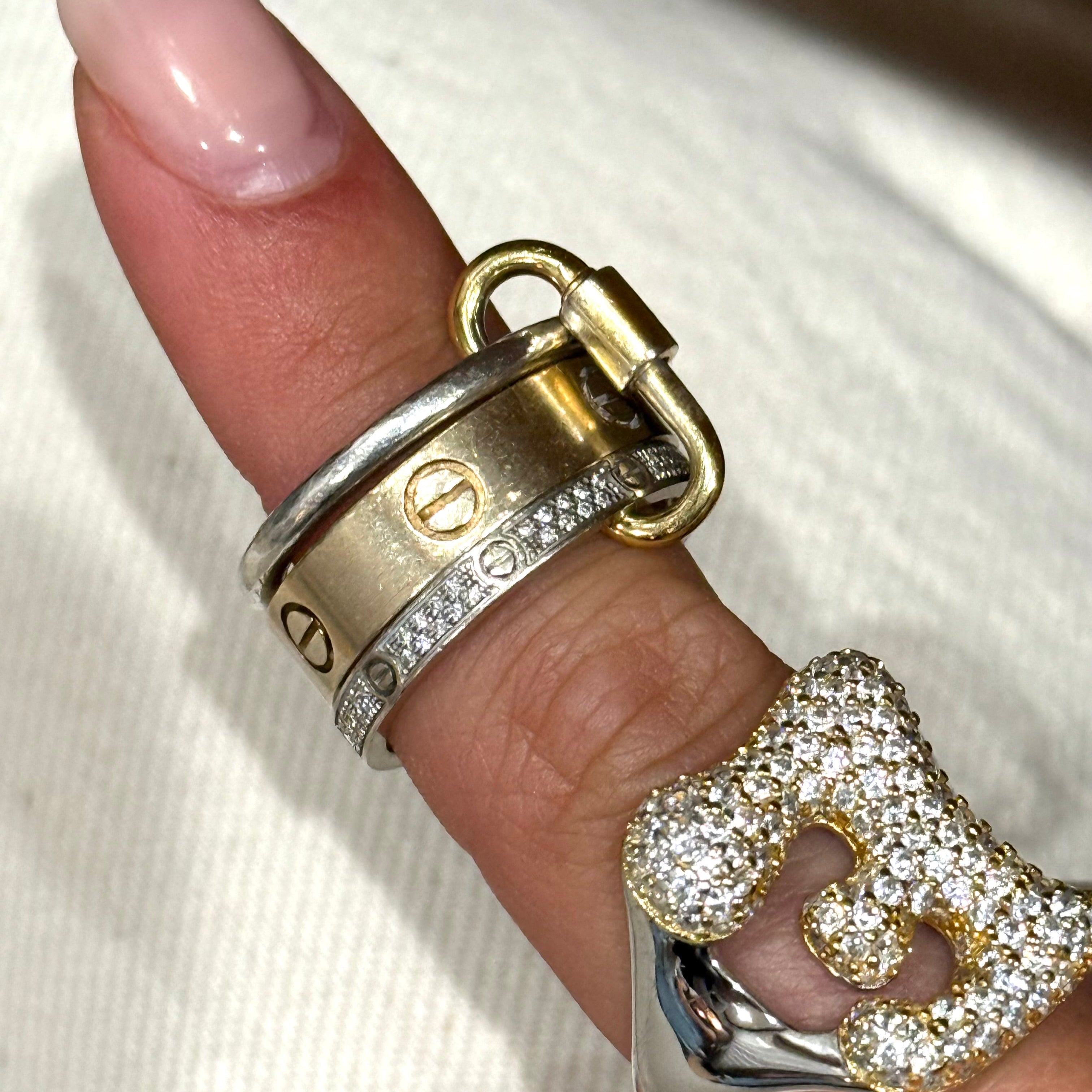 Classic Ring Link Carabiner on a ring stack worn with an iced letter ring