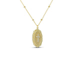 Gold Cross Pendant Necklace with an oval cross medallion on a beaded satellite chain