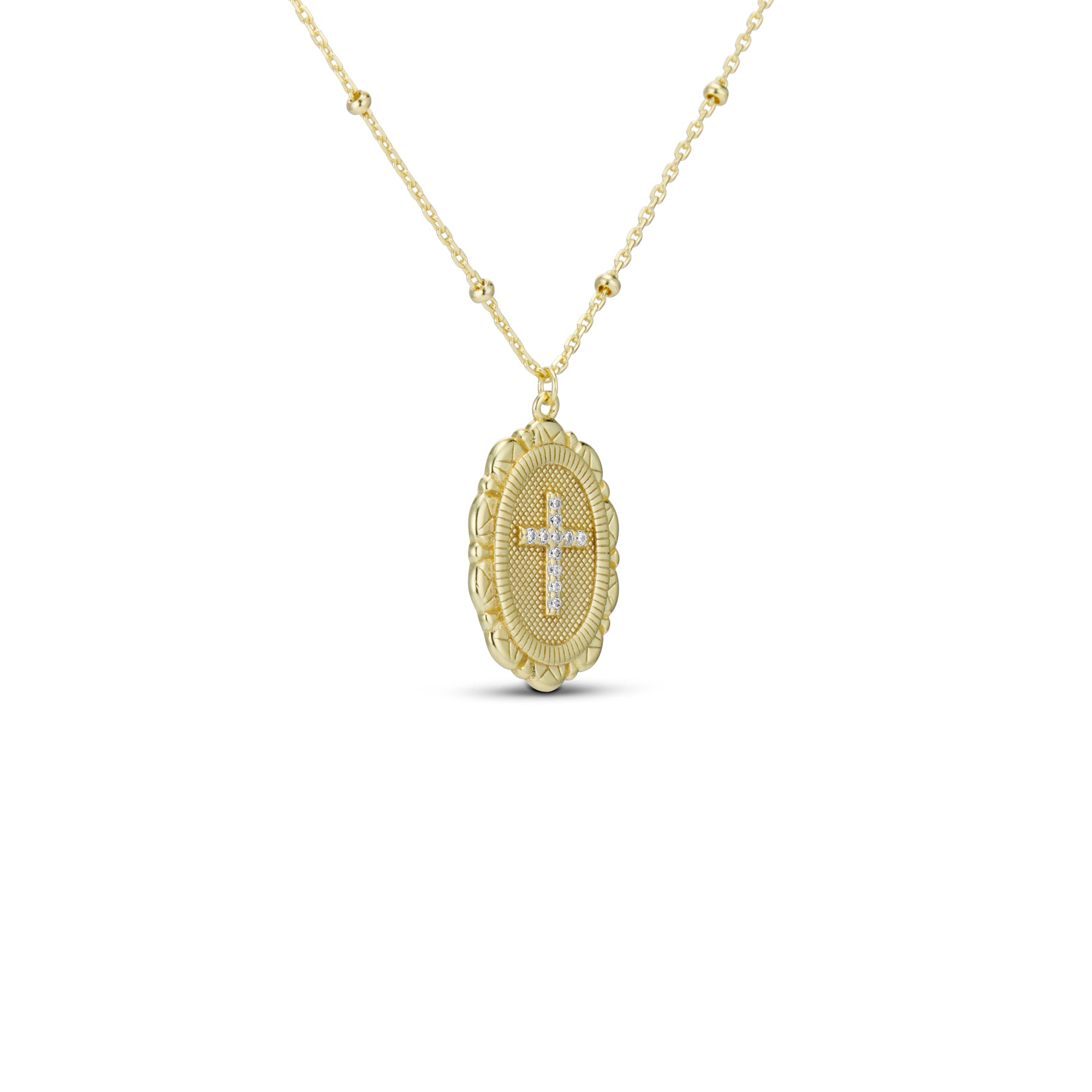Gold Cross Pendant Necklace with an oval cross medallion on a beaded satellite chain
