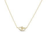 Double Hearts Necklace, two linked CZ hearts on a fine gold chain