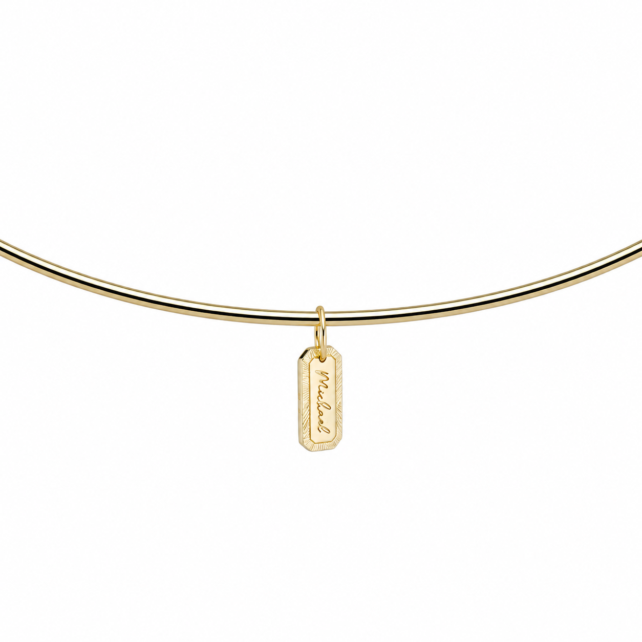 Engraved Tag Nameplate on a cuff, angled view