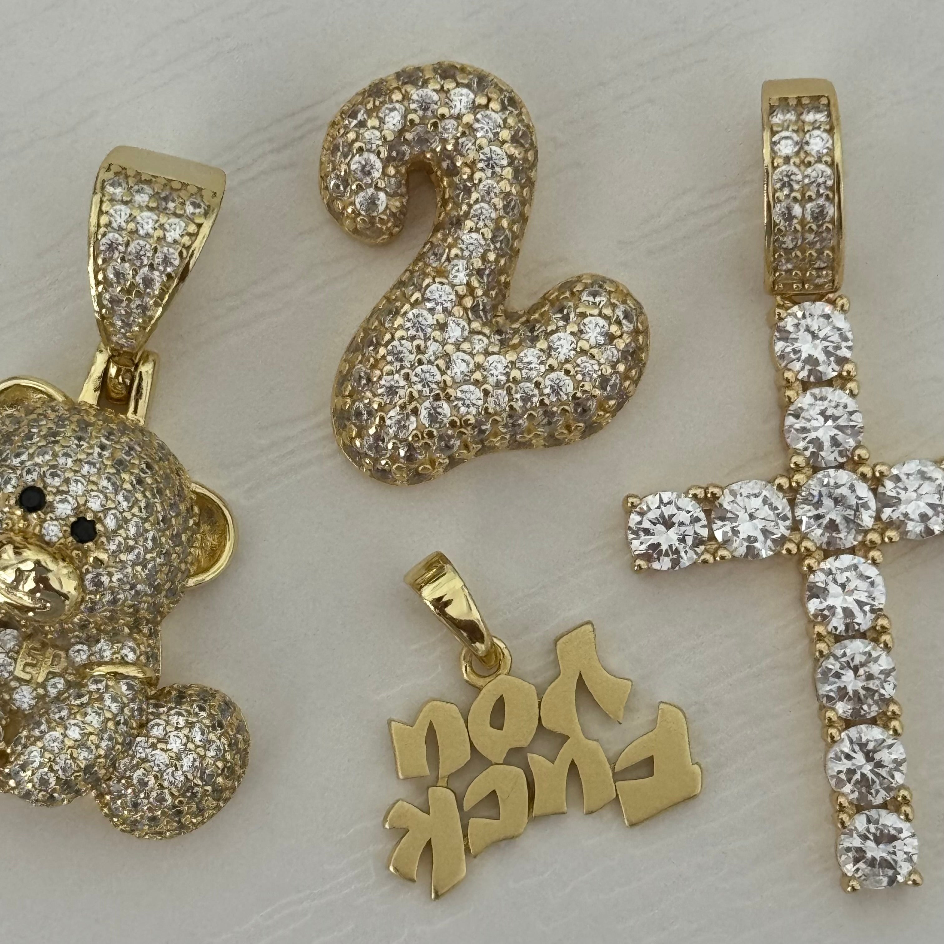 Iced EP Teddy pendant with gold CZ number, cross and script pendants