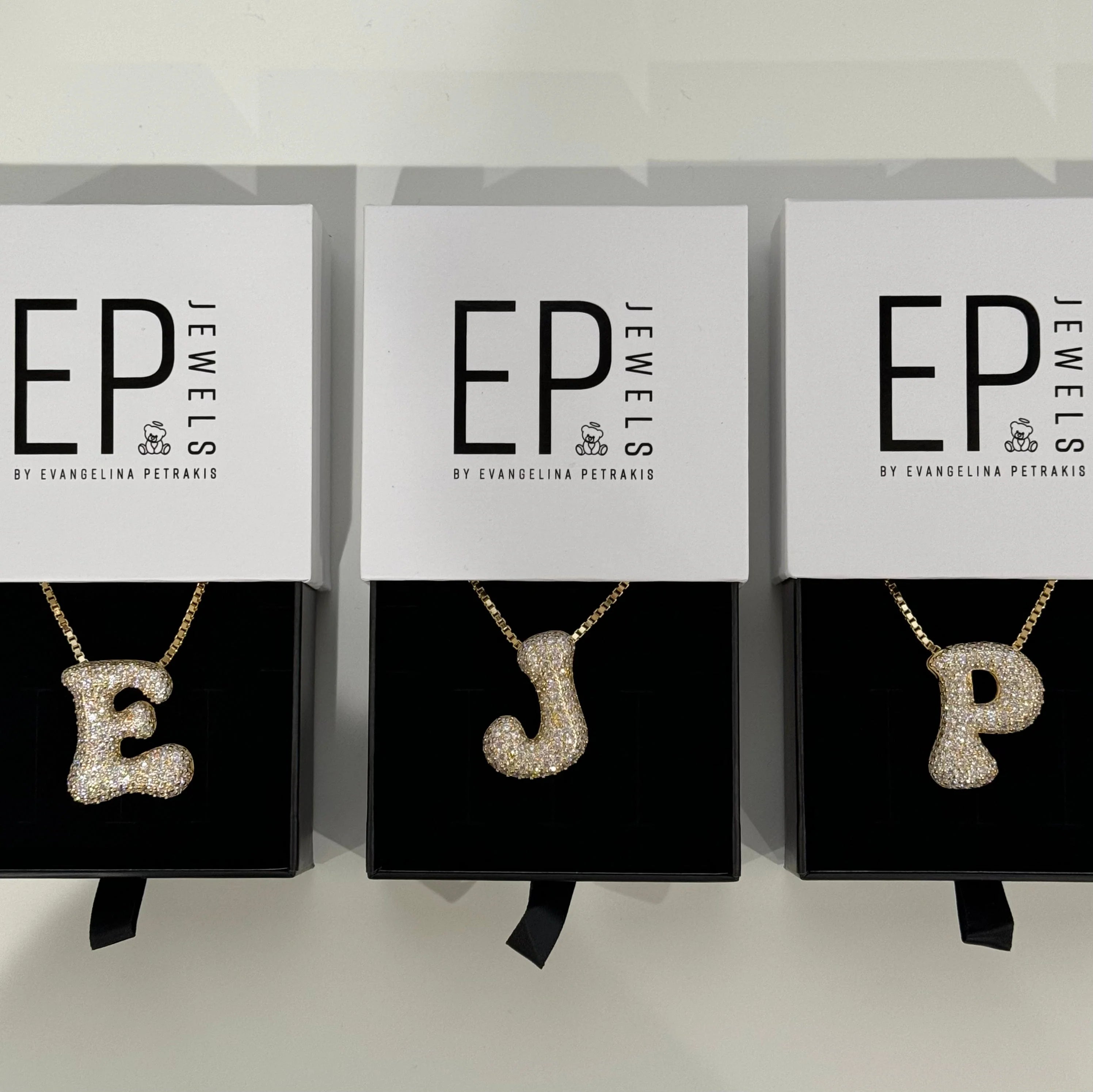Iced Jumbo Letter Necklaces in E, J and P in EP Jewels gift boxes