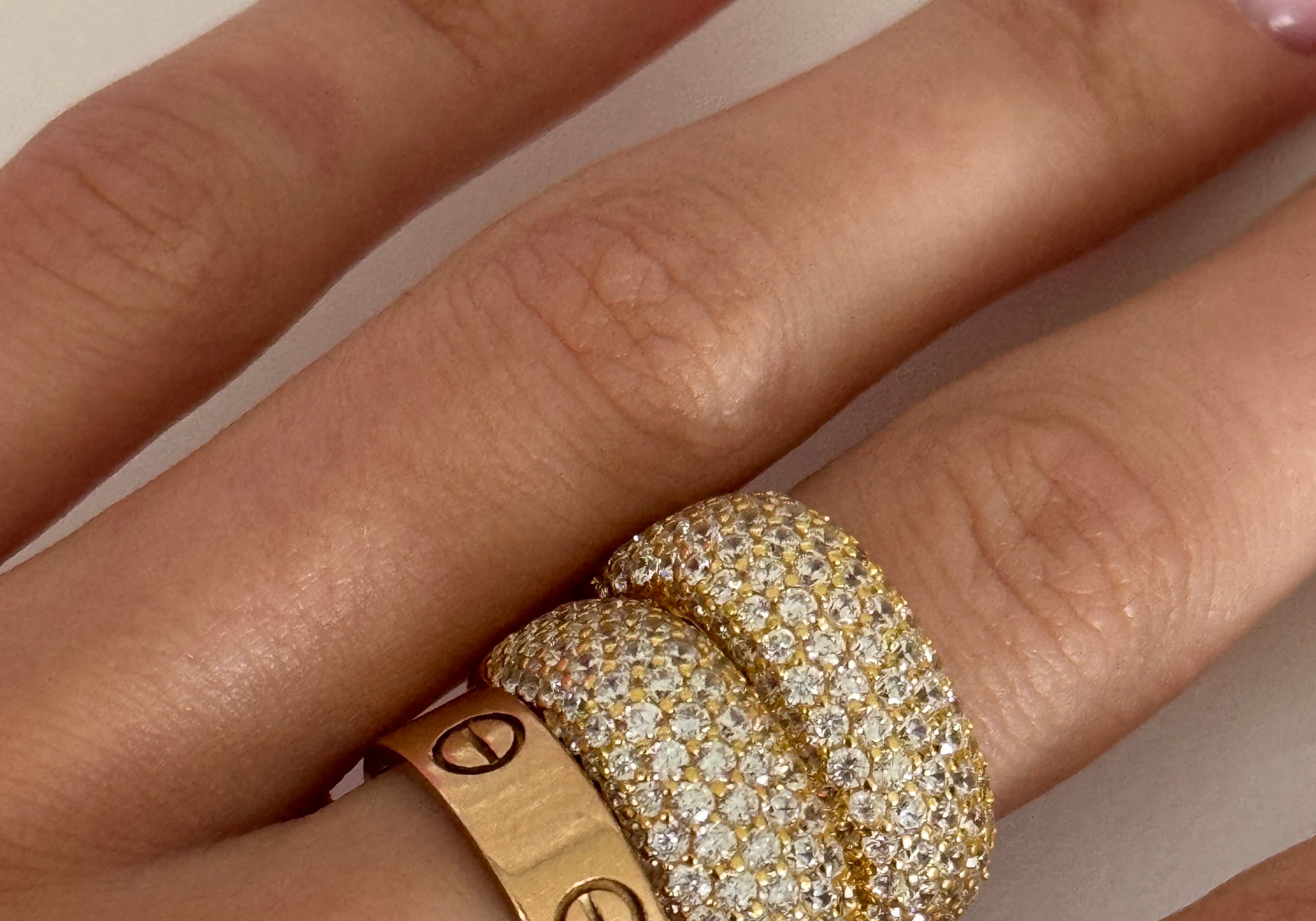 Iced Kaete Pave Rings stacked with gold bands on the finger