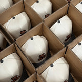 EP Teddy Trucker Hats packed in a cardboard box