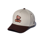 EP Teddy Trucker Hat in cream with a chocolate brown brim and embroidered teddy bear