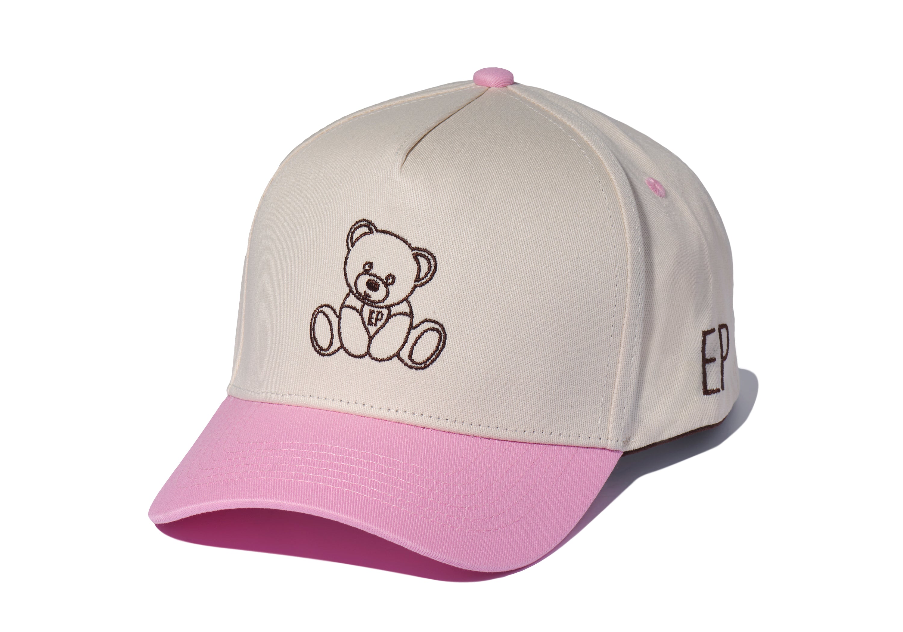Pink EP Teddy Trucker Hat with a cream crown and pink brim