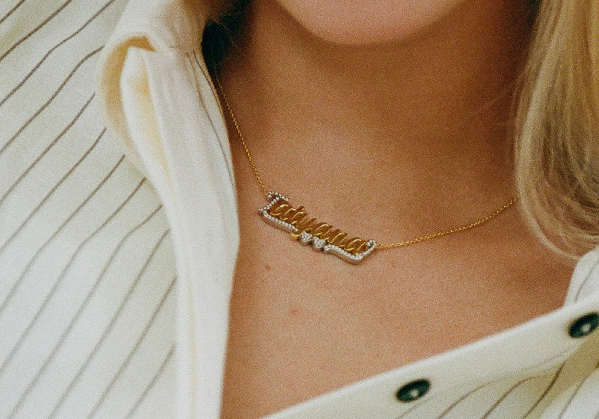 Model wearing the Two Tone Script Nameplate Necklace