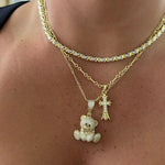 XOXO Necklace layered with a gold Iced EP Teddy Necklace and cross necklace