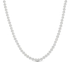 Classic Pearl Necklace laid out to show its 16 inch length plus extender