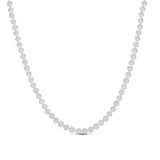 Classic Pearl Necklace laid out to show its 16 inch length plus extender